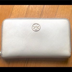 Tory Burch white wallet with fun orange interior
